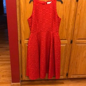 Elegant red fit and flair dress.